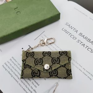 Keychain GUICC Luxury di alta qualità di alta qualità First Cowhide Case Designer Designer Mini Card da uomo e donna