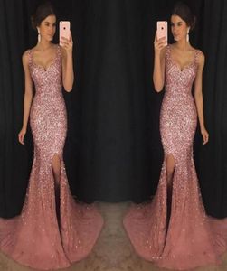 2020 Rose Pink Bling V Neck sjöjungfru aftonklänningar Luxury Crystal Beaded Pageant Dress Major Beading Split Sweep Train Formell Pro9967200