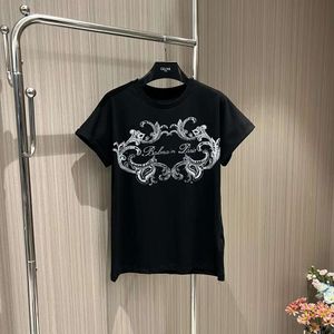 女性のパーカースウェットシャツ早春に黒い白い白いプリントレター短袖Tシャツカールしたエッジショルダードロップ