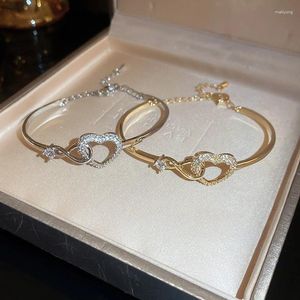 Armreifen 2024 Koreanische exquisite hohle Liebe Offenes Armbandtemperament süße romantische Mode Frauenschmuck