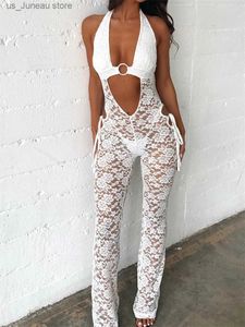 Kvinnors jumpsuits rompers Sexiga s genom blommig spets 1 stycke kvinnor jumpsuit cutout grimma elegant rygglös svart vit jumpsuits nattklubb kläder t240412