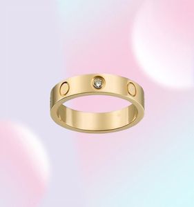 ラブスクリューバンドリングクラシックファッションデザイナーデザインチタンスチールジュエリー男性は女性の結婚指輪を約束します5939953
