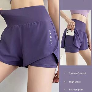 Gym Sport Shorts Kobiety elastyczne krótkie spodnie z wysokim talią z kieszeniami Fałszywe dwa sztuki legginsy jogi.