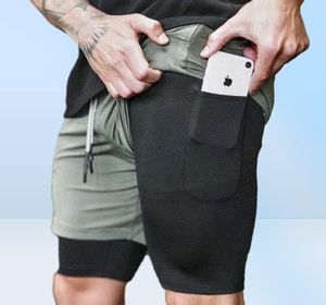 2 in1 cortometraggi sportivi in palestra da uomo in esecuzione pantaloni da tasca per telefono incorporato palestra allenamento per la palestra tascabile casual pan7164612