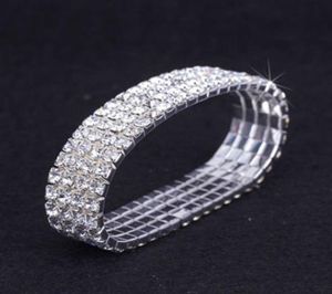 12 stycken Lot 4 Row Crystal Diamante Rhinestone Elastic Bridal Bangle Armband Stretch hela bröllopstillbehör för kvinnor5664419