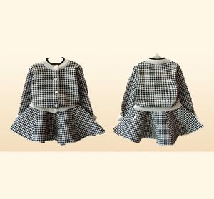 Detaljhandelsflickor koreanska stickade rutiga kjolar passar 2 stycken kläder idrottsutrymme barn designer träningsdräkter barn kläder set8794802