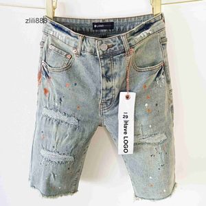 Shorts jeans da marca roxa com bordas e orifícios americanos shorts jeans de lama amarela