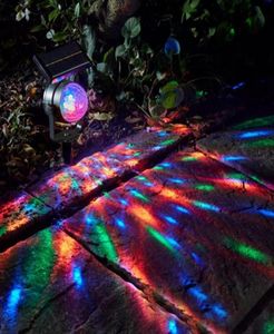 Effetti Lampada solare Lampada Proiettore LED Light Colorful Rotating Outdoor Garden Courtyard Decorazioni natalizie 64127617093697