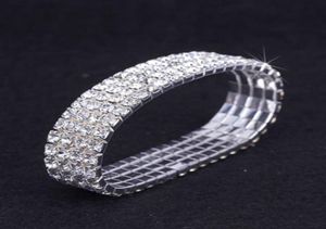 12 stycken Lot 4 Rad Crystal Diamante Rhinestone Elastic Bridal Bangle Armband Stretch hela bröllopstillbehör för kvinnor6275861