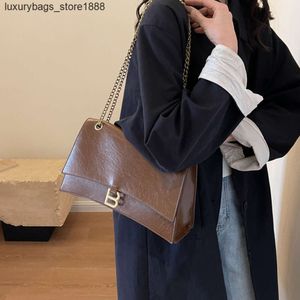 Designer Bag Factory 75% Discount Promotion Advanced Oil Wax Leather Chain Underarm Bag Women Autumn/winter New Fashion Diagonal Straddle Crack Hourglass