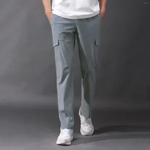 Pantaloni da uomo Ufficio di moda casual indossare gamba dritta snello snello cargo mutandine vintage alte pantaloni maschi tascabili 2024 ogni giorno