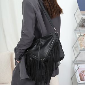 Rivet fringe shoulder bag for women new design pu leather soft cross body purse side tassel fashion luxury handbag female causal street shopping purse