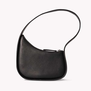 O designer de bolsas de marca vende bolsas femininas com 65% de desconto em couro de alta linha de linha de luta de couro irregular para moda e simples