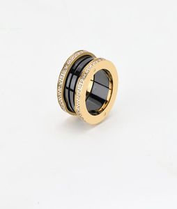 Cuubic Zirconia utwardzona na krawędzi Czarne białe ceramiki wiosenne pierścienie dla kobiet mężczyzn dziewczęta panie pierścienie midi logo klasyczny projektant ślub 2943302