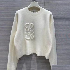 Kvinnors tröjor 23SS Ny kvinnors tröja Autumn Trendy Long-Sleeved Top High-End Slim Plover Coat Designer Women White Thin Knit Drop Dhuvo