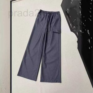 Designer de calças masculinas No início da primavera, nova moda de tração calça calças clássicas de triângulo invertido Casual Casual Pocket Calça 1lgj