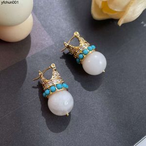 Small Group Designer Micro Inlaid Zircon Crown Stone Earrings with a Sense of Luxury Fashionable and Exquisite Light Silver Needle