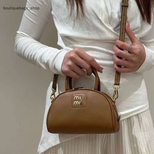 Diagonal väska modedesign Ny Miao handhållen singel axelstrenning trendig
