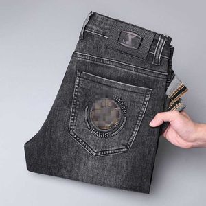 Lyxdesigner jeans för mäns nya jeans för mäns ljus lyx tjocka elastiska fötter smala fit ungdom blå svarta byxor mode byxor