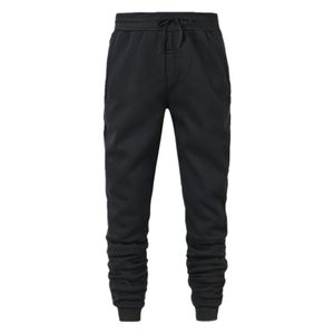 Män kroppsbyggande byxfjädertrakten Sweatpants Casual Solid Slim Harajuku Style Trousers