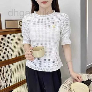 Marcas femininas Tees Designer Brand como um pequeno estilo de fragrância Hollow Out Hook Flower Bubble Sweater de malha para a primavera Summer New Short Top G6BJ