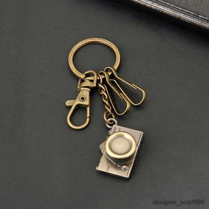 Клавные ланирды Wannee Fashion Mini Retro Bronze Metal Car Key Chain Multi -камеры струны стильные брелоки для мужчин подвеска для творчества творческий подарок украшения