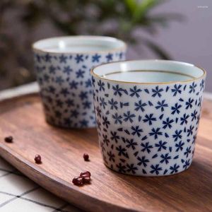 Tazze di piattini ceramica tè giapponese tazza di latte d'acqua ristorante teatrale domestico grande cpacia crea creativa blu e bianca tazza da tè in ceramica bianca