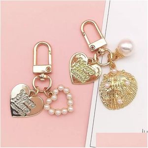 Keychains & Lanyards Cute Pearl Shell Keychain Ins Metal Jewelry Keyring Accessories Creative Small Gift Bag Pendant Drop Delivery Fa Dhbre