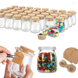 Bottiglie di stoccaggio 10pcs reusibili barattoli di vetro da 100/200 ml con coperchi in sughero etichette e corde di contenitori vuoti per la marmellata decorativa fai -da -te miele