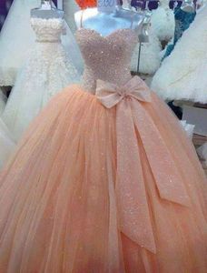 Błyszczące cekinowe Bling Princess Ball suknie na bal maturalny pomarańczowy vintage quinceanera sukienki z łukiem spaghetti Paski piętro Leng8170362