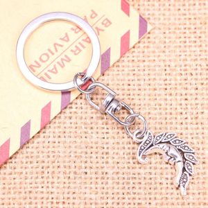 Keychains 20pcs Mode Keychain 27x17mm Mond Anhänger DIY Männer Schmuckwagen Schlüsselkette Ringhalter Souvenir für Geschenk