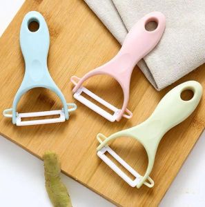 Fruktgrönsaksverktyg Creative Ceramic Peeler Potato Peelers Kök Tillbehör Verktyg Kök levererar keramikfrukter Knivskinn 0413