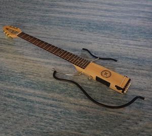 I Stock Mini Travel Electric Guitar Portable Mute Folk Guitar High Comfort Guitar Patent Products äkta hela2194614