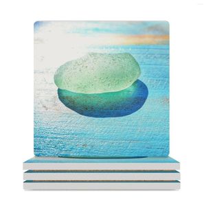 Tischmatten Meerschaumglas sonnenbeschwert auf türkisfarbenem Holz Hintergrund Keramik Untersetzer (quadratisch) Stand süßer Tasse