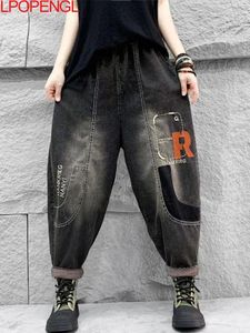 Dżinsy dżinsowe kobiet 2024 Spring retro styl etniczny w trudnej sytuacji jeansowy prosty literacka elastyczna talia luźna streetwear proste spodnie