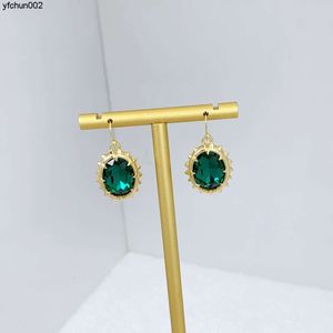 Fenggui Talent Designer Inlaid Green Oval Transparent Fashion Natural Durian Ear Hook {category}