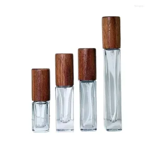 Garrafas de armazenamento 20pcs 3ml 5ml 10ml Garrafa de perfume de vidro Recarrada de vidro cinza mini quadrado de frascos de madeira vazia Automizador de spray de tampa de madeira