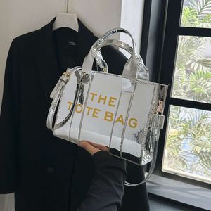 Handväska designer 50% rabatt på heta varumärkesväskor väskor med stil sommaren nya och enkla små fashionabla axlar