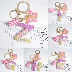 Nytt söt harts A-Z Initialer Letter Neychain Pink Sparkle Butterfly Tassel Pendant Keyring For Women Girl Purse Handbags Jewelry Gift