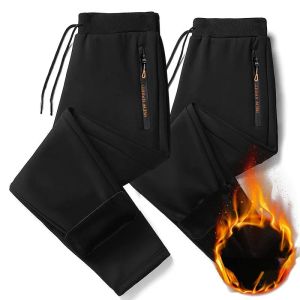 Pantaloni pantaloni sportivi peli spessi isolanti a doppio strato isolamento tasche con cerniera traspirante che gestisce pantaloni da uomo casual autunno inverno