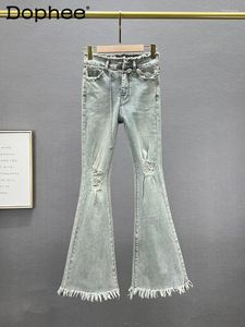 Jeans femininos rasgaram calças de jeans de jeans 2024 primavera no verão de cintura alta em estilo europeu estilo magro desgastado