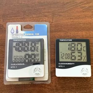 Termômetro digital de higrômetro de temperatura LCD Digital Termômetro de umidade com alarmes do calendário de relógio HTC-1 100 peças para cima