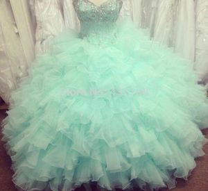 2019 New Sweetheart Crystals Quinceanera Dresses Sweet Sixteen Sequined Strapless Ball Gowns Beaded Princess Prom Gowns Custom Mad6551902