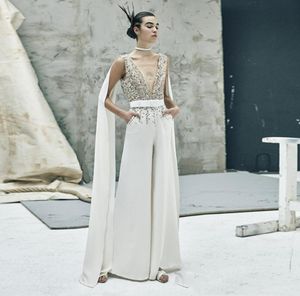 Special Design White Jumpsuit Formell aftonklänning Sheer -paljetter med pärlor Vneck Prom -klänning med wrap Saudiares stil Receptionsklänning4864842