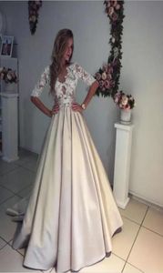 2017 Beach Wedding Deths Ivory and Champagne v Neck Sheer 34 Long Sleeves Weist Rist Court Train Bearls Closure Bridal 4507825
