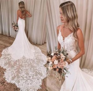 Wspaniała biała koronkowa koronkowa sukienki ślubne Seksowne paski spaghetti otwarte z tyłu długie szaty pociągu de Mariage Custom Made Backless5366654