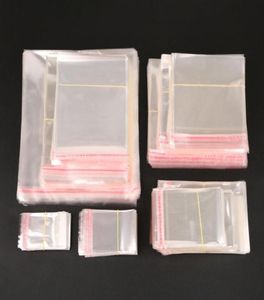 Novos chegados 200pcs Pacote de jóias claras de focas autônomas Sacos plásticos transparentes para opp, embalando sacos de presente de plástico para jóias265780142