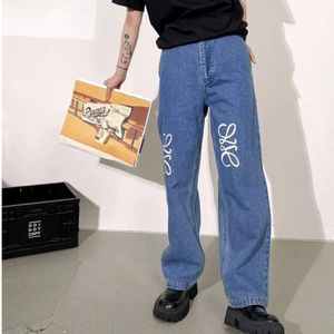 Kvinnliga jeans designer byxor kvinnor män brev broderade grafiska denimbyxor lösa jeans lyx mode fasta färg denim byxor