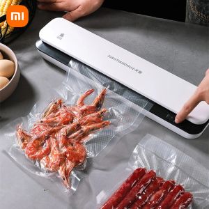 Sealers Xiaomi Ny elektrisk tätningsmaskin 220V Mini Hushåll Vakuumtätningsmaskin Matförpackningsmaskin Följande matförseglare