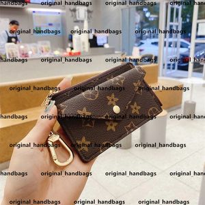 Designer Lvity Påsar M69431 Wallet Card Holder Recto verso Designer Leather Fashion Womens Mini Zippy Organizer Wallet Coin Purse Bell Belt Charm Key Pouch